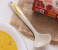 Royalford RF8058 8-inch Melamine Ware Super Rays Spoon - Ivory & Yellow 4 in UAE