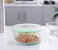 Royalford RF9823 950ml Round Airtight Glass Container - Clear & Green 1 in UAE
